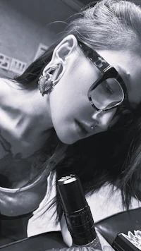 a woman with a tattoo on her arm