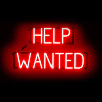 a red neon sign that says help wanted on a black background
